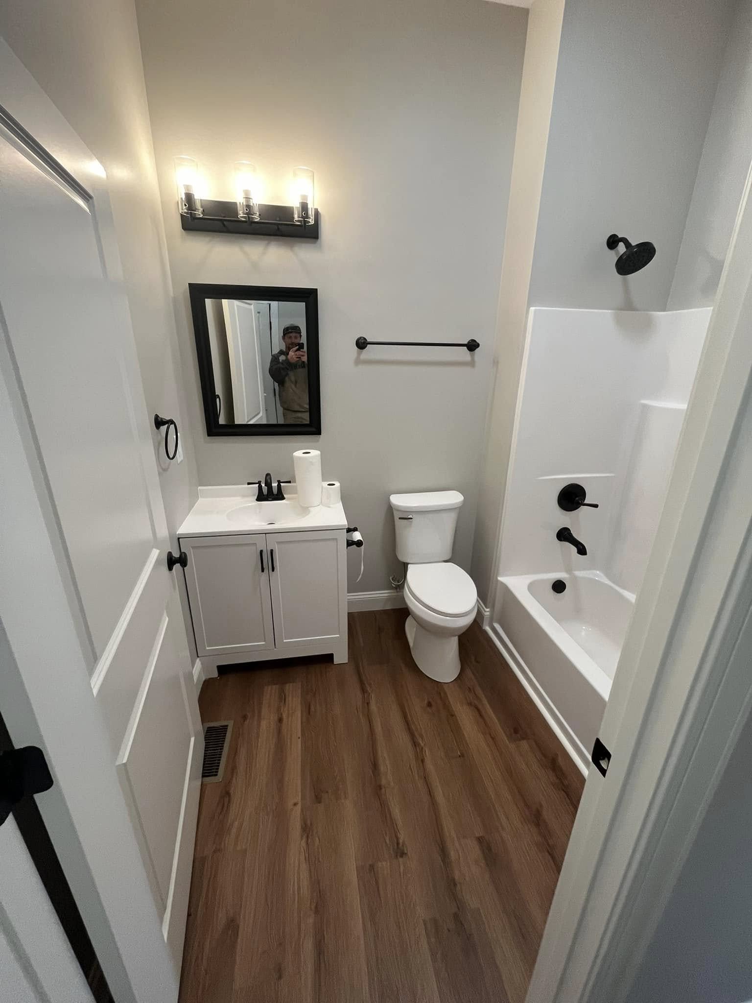 Basement Bathroom Installation in Easley, SC project by Upstate Construction & Renovation