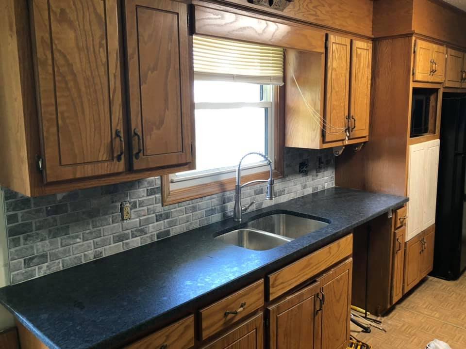 Backsplash Installation in Easley, SC project by Upstate Construction & Renovation